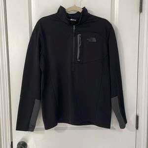 The North Face. Men’s black half-zip. Size large.